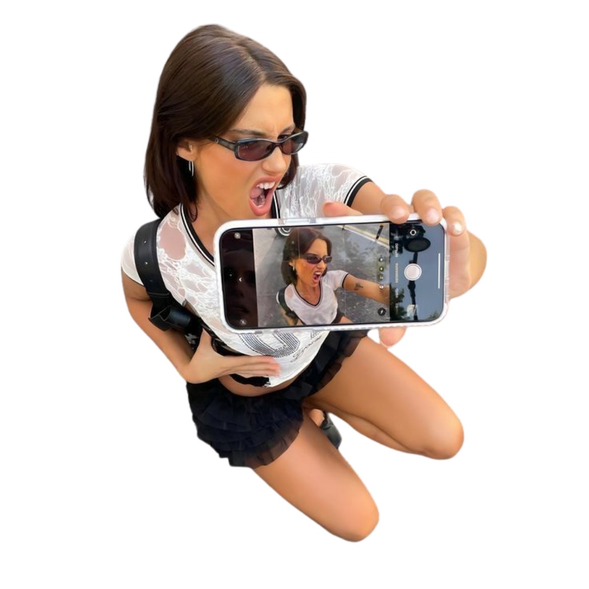Creator taking a selfie with her phone toward the viewer, representing Yourstyle in the digital world.